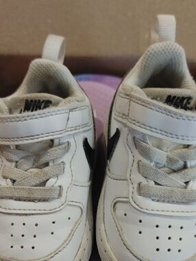 Nike Toddler White Sneakers with Black Swoosh